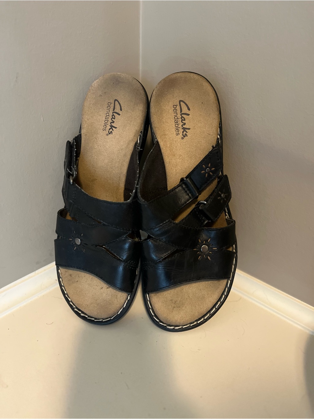 Clarks “Bendables”Black Leather Double-Strap Slide Sandals With Floral Cutouts